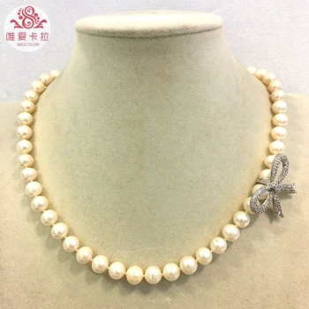

WEICOLOR White Nearround Cultured Natural Freshwater Pearl Necklace With Butterfly! N Wearing Styles For All Girls!