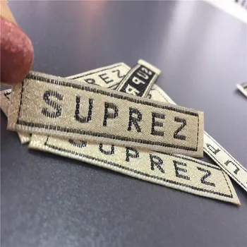 

Custom Shiny Bright Gold Material Clothing Labels Name Labels Brand Name Tags Woven Garment Labels
