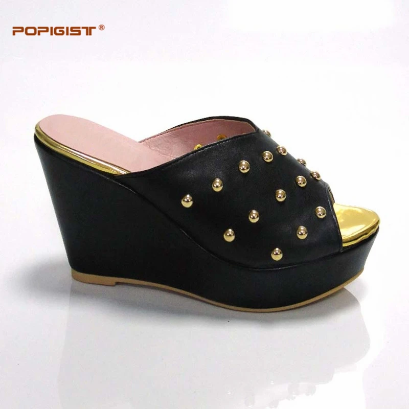 Black ladyshoes metal decoration and wedge sandal