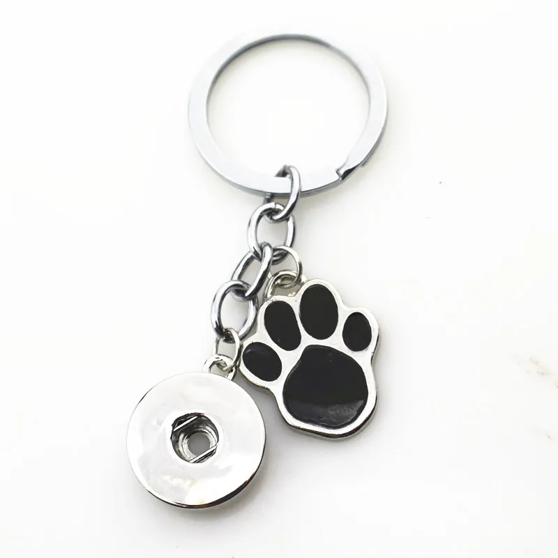 10ชิ้น/ล็อตขายส่งสีดำสุนัข Paw Snap พวงกุญแจ Keyring 18มม.DIY Snaps