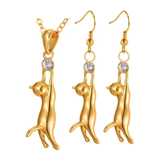 gold puma earrings