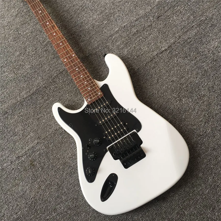 

High quality ST electric guitar, electric guitar in his left hand, real photos, double wave electric guitar, white