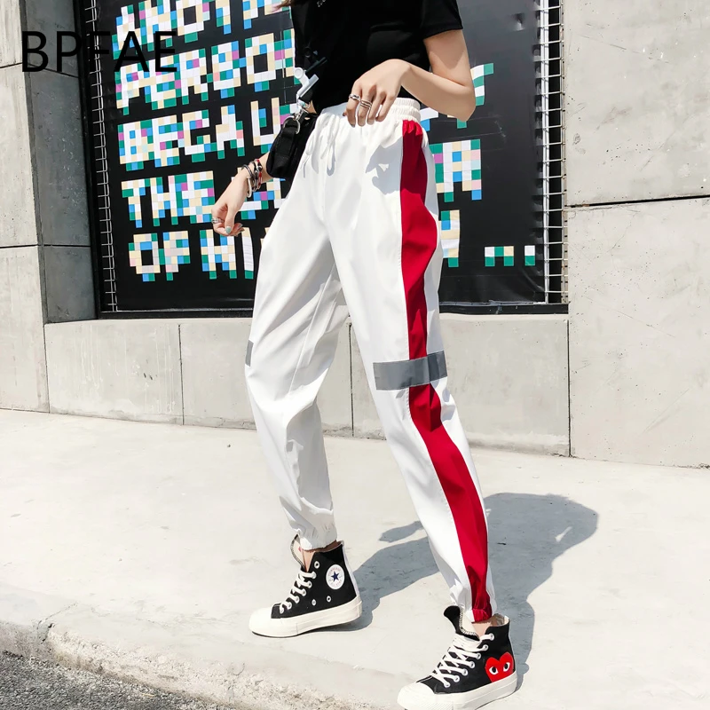 white pants red stripe