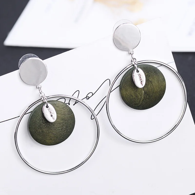 

Diana fashion simple earrings temperament wooden earrings female Japanese and Korean popular geometric metal ring earrings