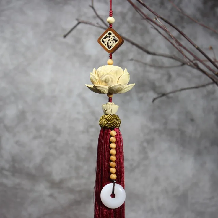 

Car pendant car interior hanging boxwood carving lotus car high-grade security pen pendant