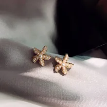 MENGJIQIAO 2019 festivo coreano mar lindo perla simulada de estrella de mar, pendientes para las mujeres dulce elegante joyería Oorbellen regalos