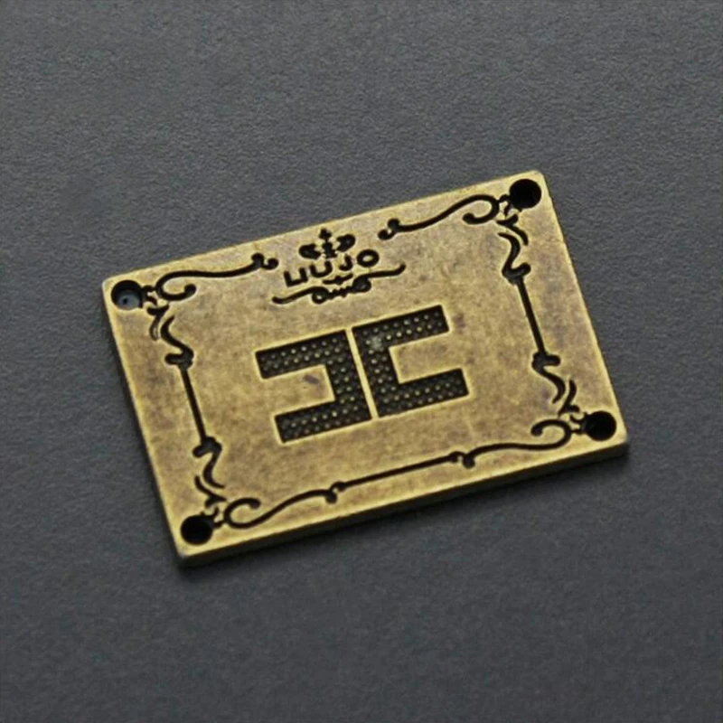 

10pcs high brand clothing trademark sewing letter nameplate for clothes bag shoe trademark 1*2.3cm H nameplate for bags