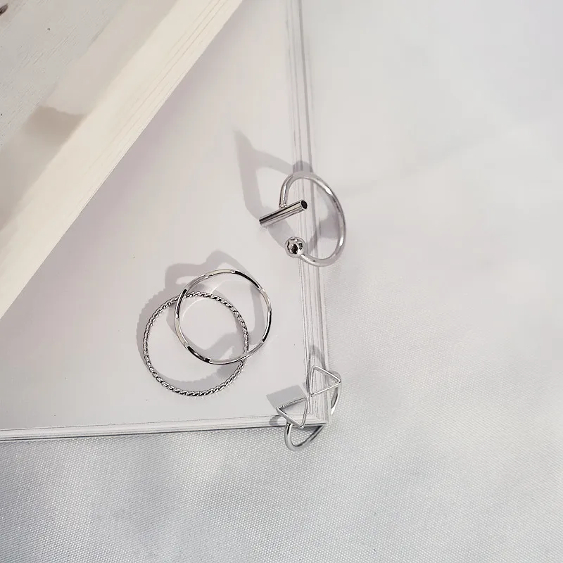 

Hollow Triangle 4 Kinds Adjustable Geometric Silver Rings Set for Women