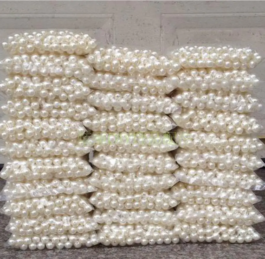 

500 g per bag DIY manual materials scattered bead accessories ABS imitation pearl Pure white double hole 4-20 mm round bead son