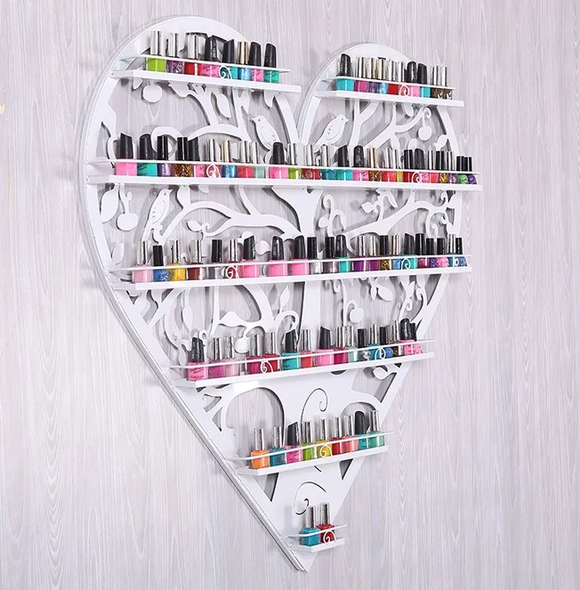 Nail polish store shelves display shelf. Hanging frame, wrought iron heart cosmetics.