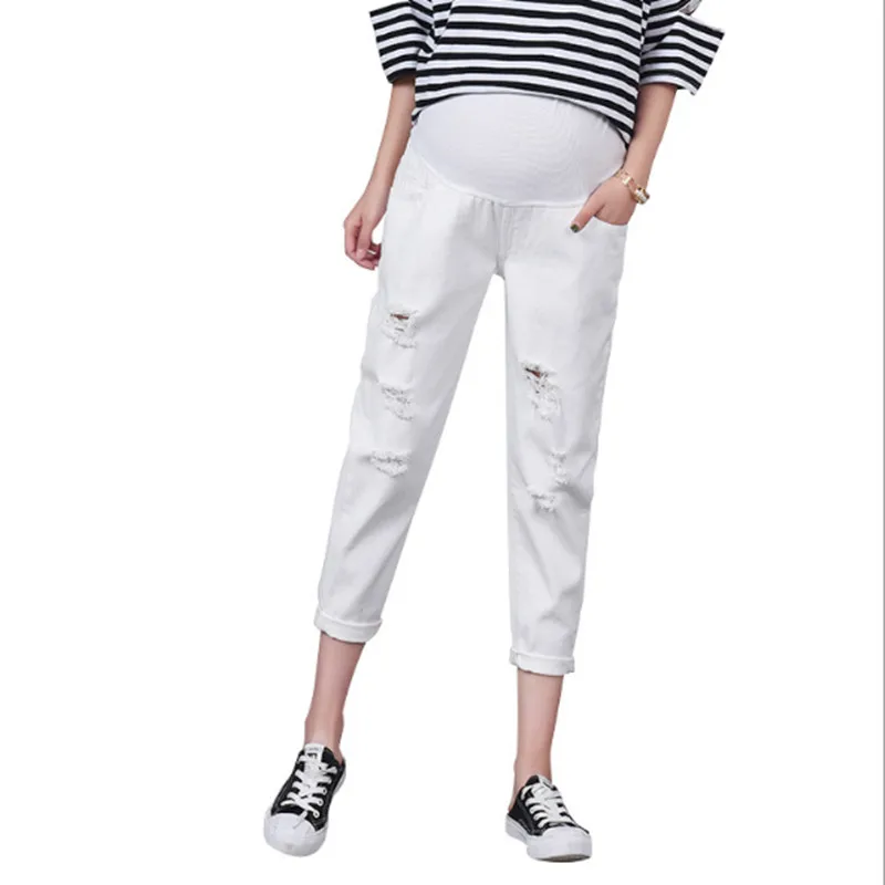 

New white pregnant stomach lift pants Fashion maternity hole jeans loose comfortable pregnancy pants