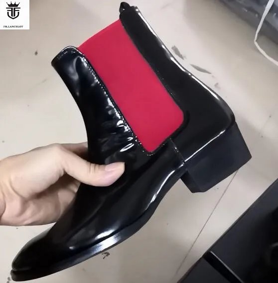 black chelsea boots with red elastic