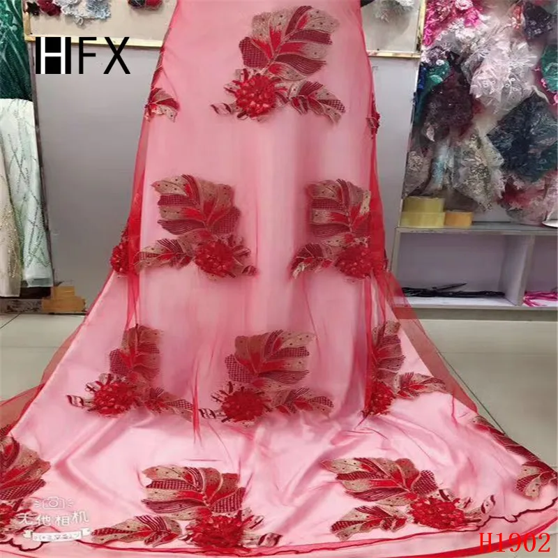 

Luxury French net lace fabric with wedding dress high quality 2019 African Handmade Of Stones And 3D Flowers Beaded lace fabric