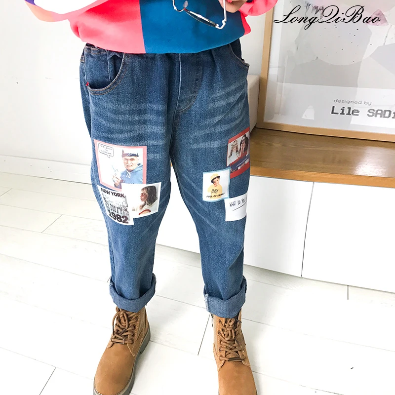 

Baby girl jeans 2018 autumn dress big children children elastic waist printing tide Korean casual pants