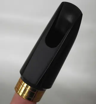 

Hard rubber +metal soprano sax mouthpiece Good material