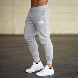 Новый Для мужчин s повседневные брюки для пробежек Фитнес Для мужчин спортивная нижняя часть спортивного костюма узкие пот Штаны брюки