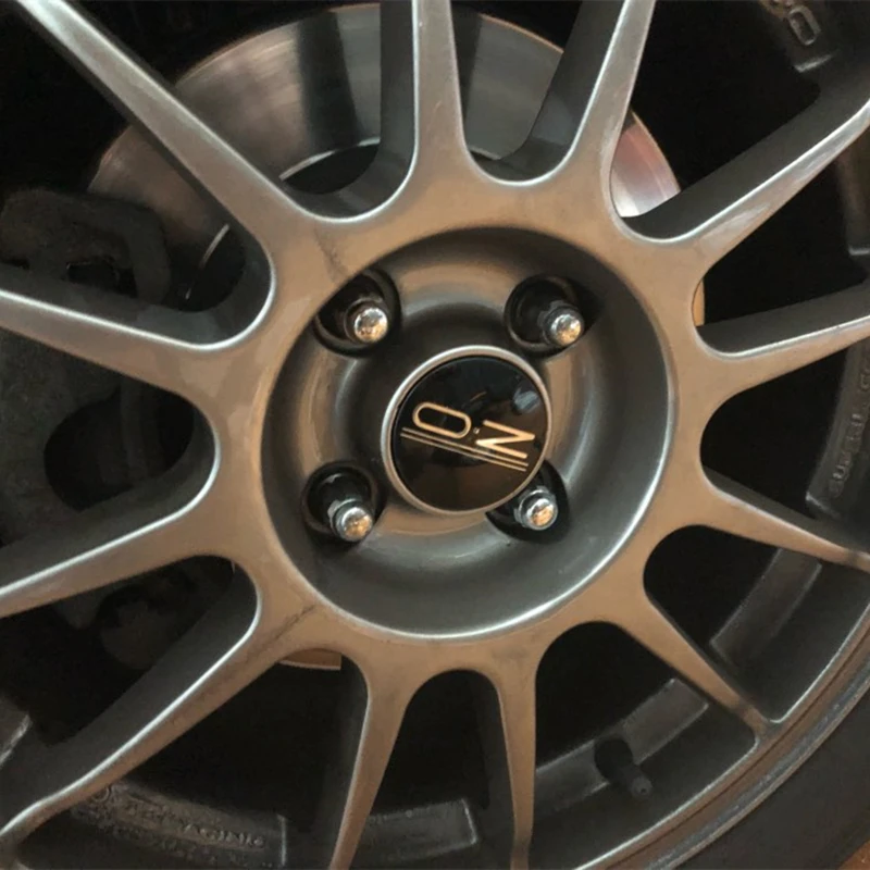 

4 Pcs High Quality OZ Racing Wheel Center Badge Hub Cap Cover M582 55mm for O.Z Superturismo Ultraleggera F1 Racing Wheel