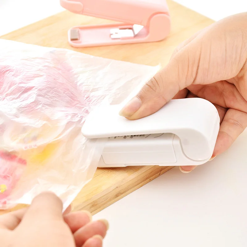 

Portable Bag Clips Mini Electric Heat Sealing Machine Impulse Sealer Seal Packing Plastic Bag Hand-press Sealing Machine