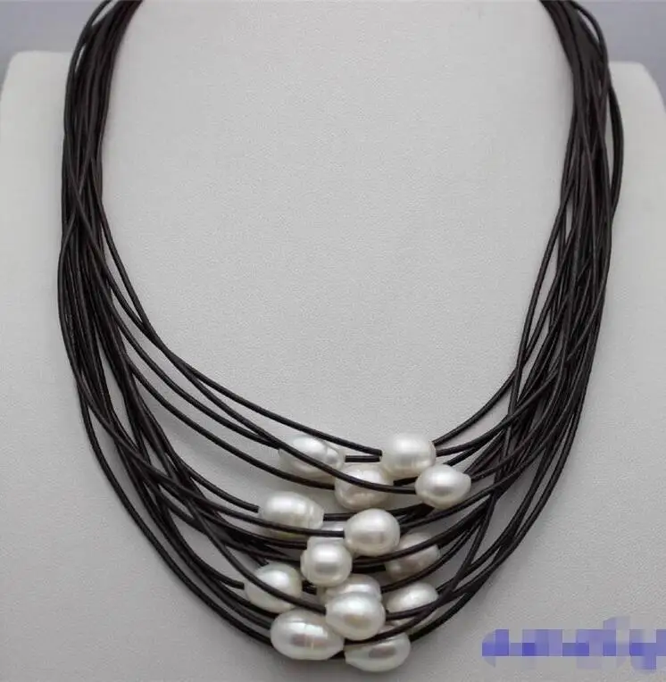 

Hot selling free shipping******* White freshwater pearl 15strand dark brown leather necklace 19-23"handmade"alloy