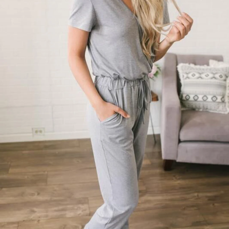 Womens rompers jumpsuit Cotton loose jumpsuit summer 2019 macac�es elegantes Solid color Vneck tie pocket jumpsuit New fashion Womens rompers jumpsuit Cotton loose jumpsuit summer 2019 macac�es elegantes Solid color Vneck tie pocket jumpsuit New fashion