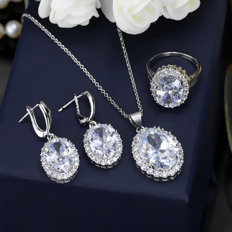 

Fashion Jewelry Silver color Sets Sparkly Drop type Shape Crystals from Austrian Pendant Necklace And Earring rings Sets
