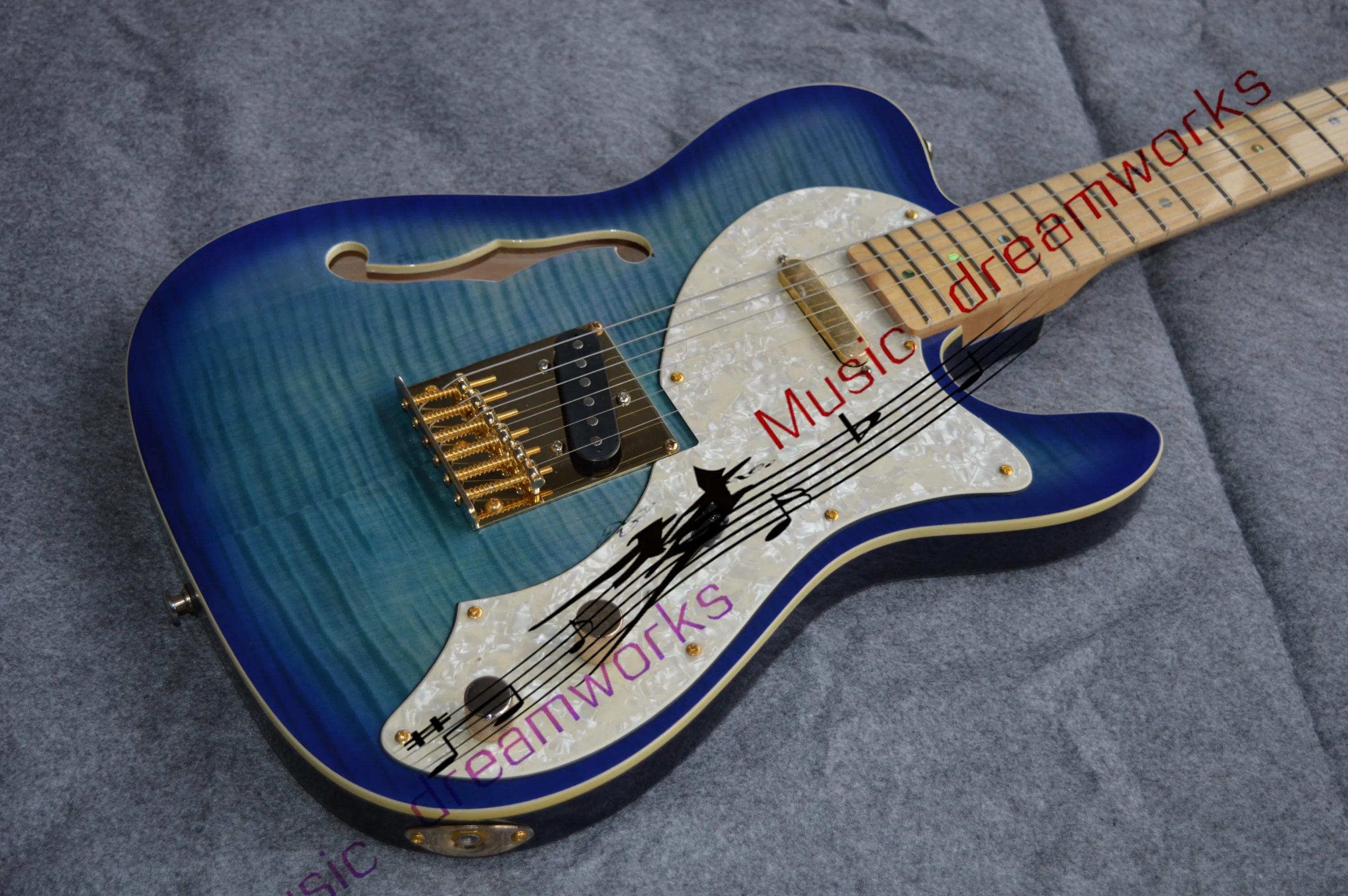 

China firehawk electric guitar, F holes. blue. Half hollow guitar maple neck Free shipping