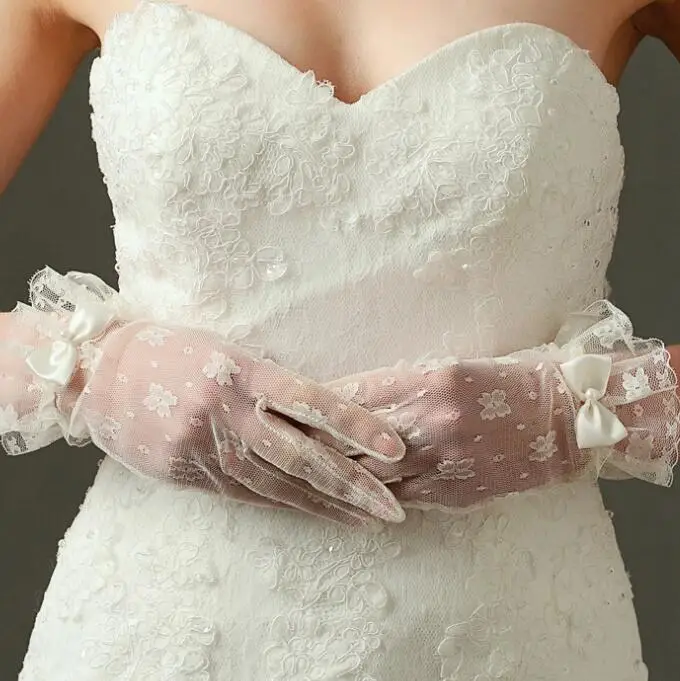 

Women's elegant white color lace glove female spring summer sunscreen transparent bow glove R1481