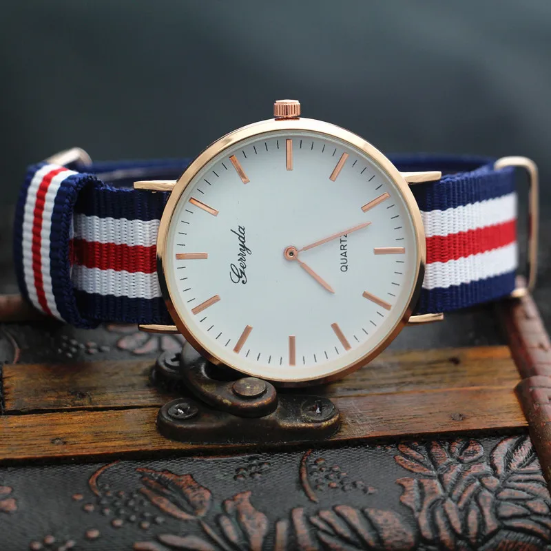 

Free shipping!Nylon webbing band,Alloy round case,quartz movement,Two hands display design dial,fashion woman lady quartz watch
