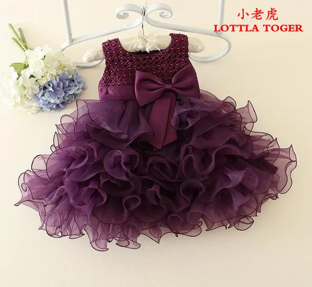 baby girl in wedding dress