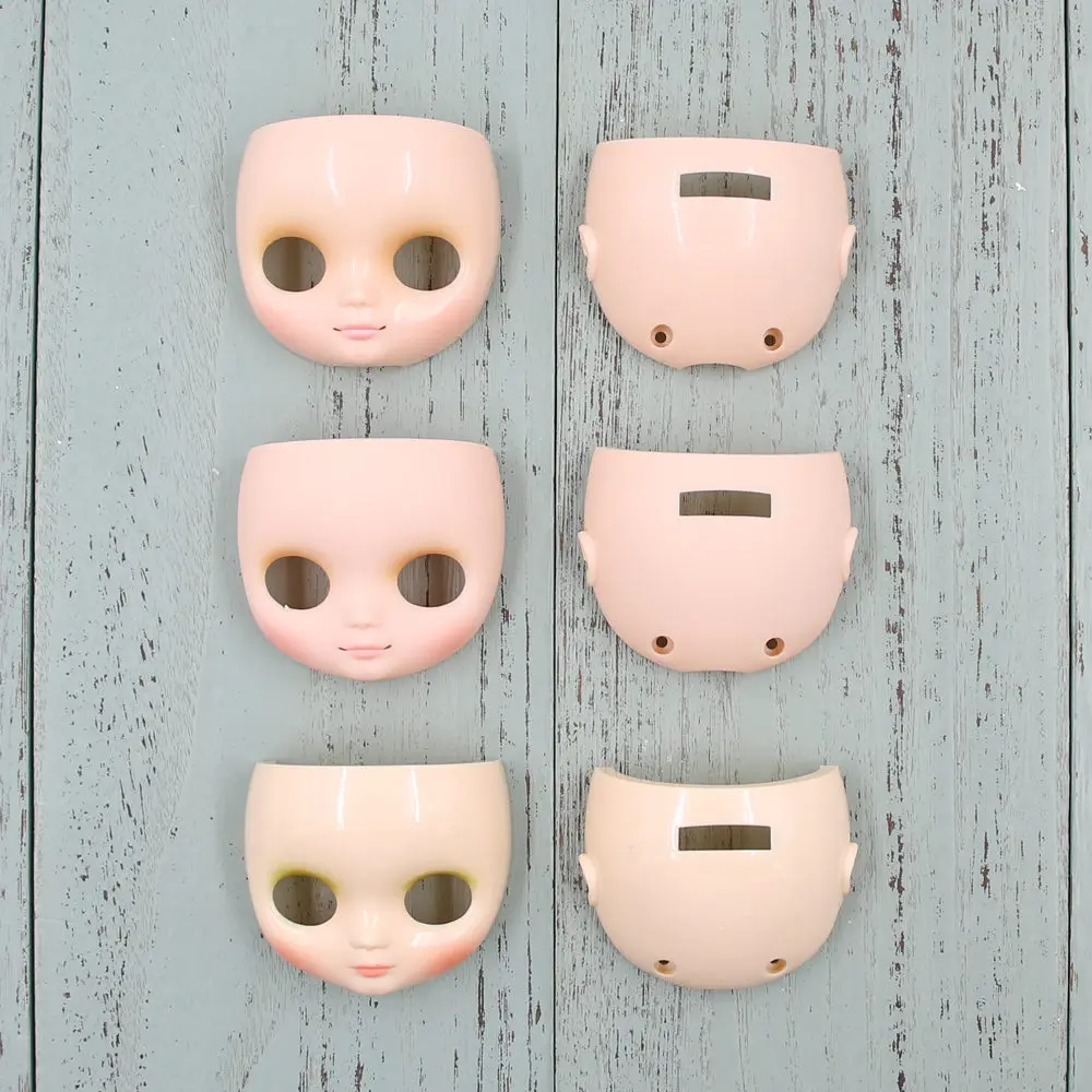 

Middie Blyth faceplate with the Back of the Surface Shell and Screw White Skin matte shell and glossy shell