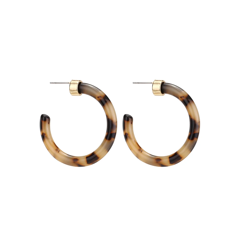 Very large acrylic and bronze statement earrings.