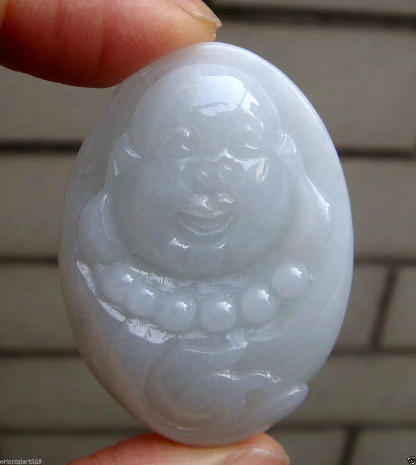 

Certified Light Green Icy Jadeite Jade Hand-Carved Buddha Ruyi NetsukeGrade A