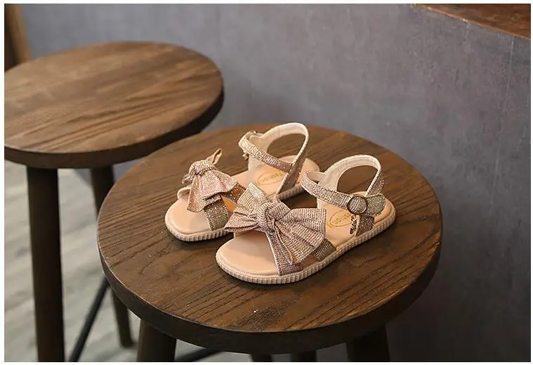 Новые Летние босоножки для девочек с бантом для малышей пляжные сандалии Дети лук Повседневное цельное платье обувь розовый черное золото