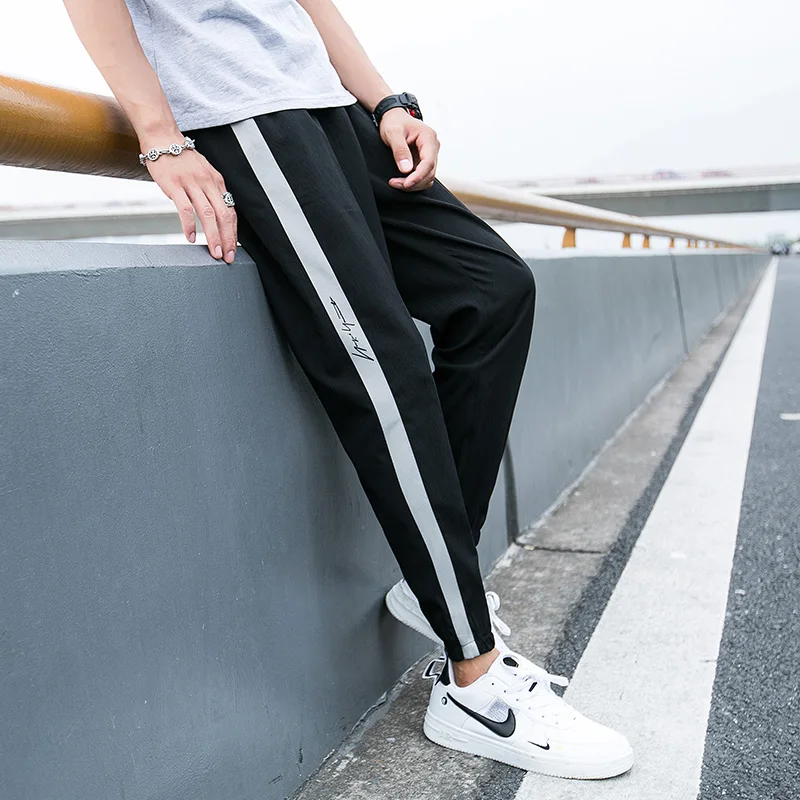 

Paragraph Lang Legendary sport pants men's casual pants are skin-friendly and breathable in a new summer 2019 style