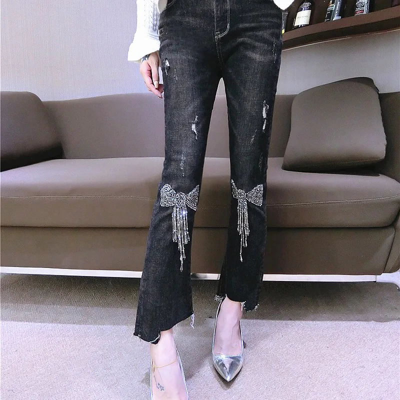 

2018 Jeans women Tide brand autumn new sequin bow tassel stretch Slim thin female speaker nine pants Black cowboy Mid waist