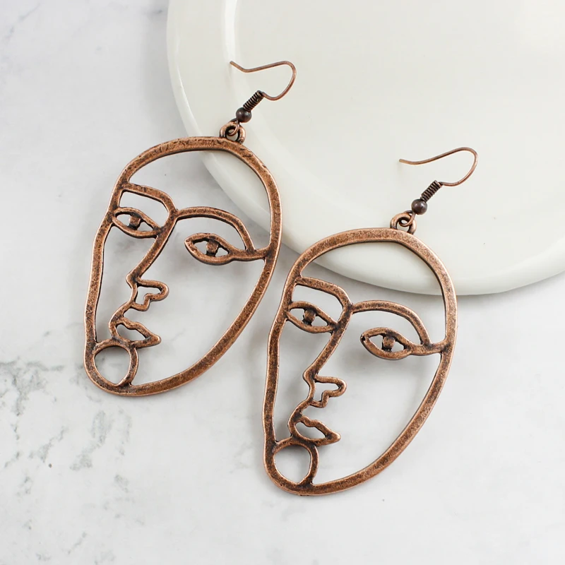 

Hollow Human face Facial expression Earring Bronze Vintage Ethnic Earrings Personality Creative Accessories Send Friends Gifts