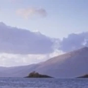 Castle at dusk with mountains in the background  Castle Stalker  Argyll  Highlands Region  Scotland Poster (18 x 6)