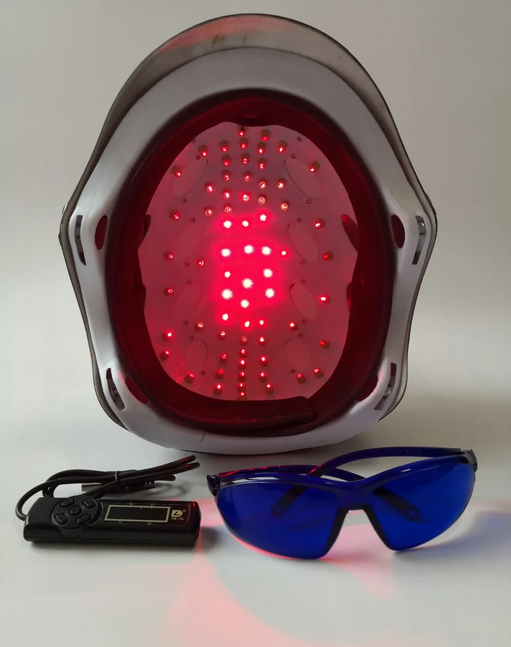 Baratos UE enchufe de EE. UU. 110 V 220 V productos para la pérdida de cabello sistema de cultivo de cabello calvidades 650nm casco de tapa láser para venta