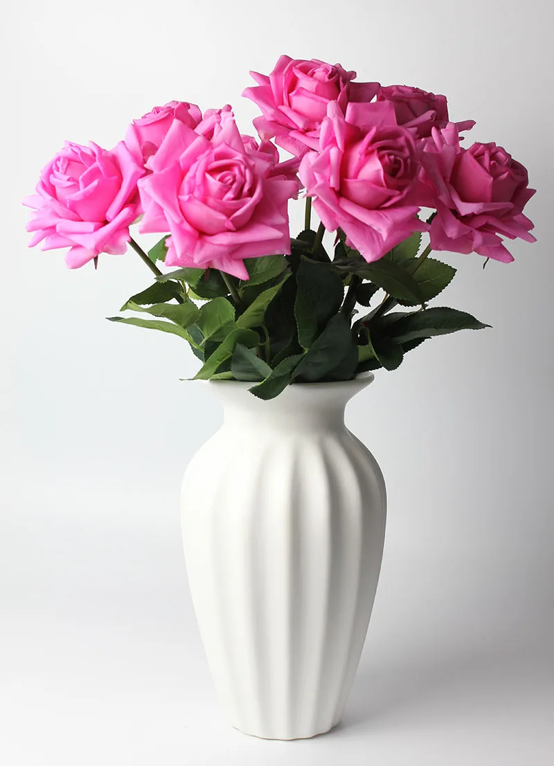 8 pink purple in a large vase
