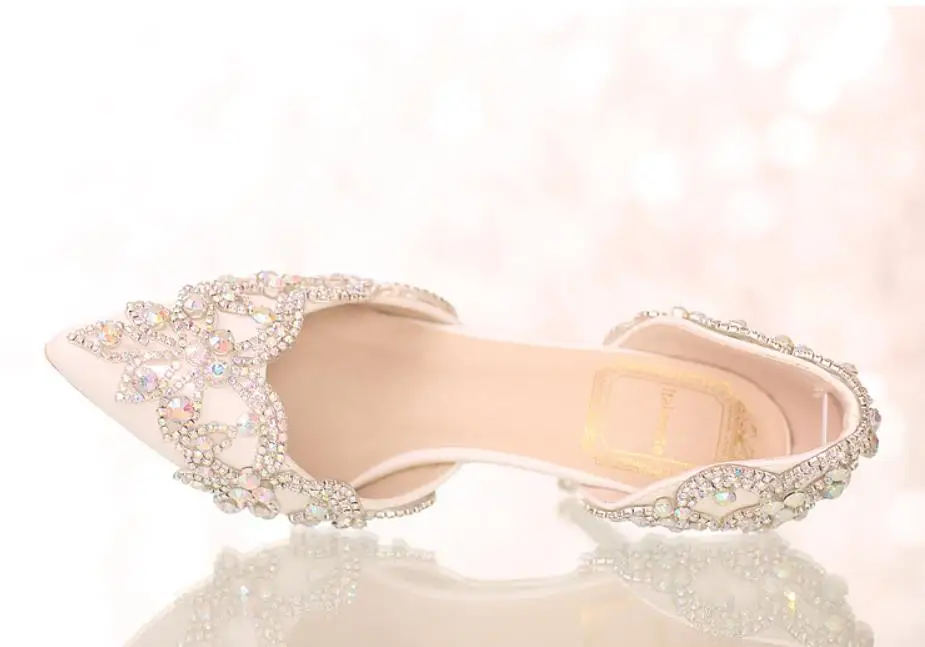 Spring and summer new fashion water drill fine heel side empty pointed high heel wedding shoes Spring and summer new fashion water drill fine heel side empty pointed high heel wedding shoes