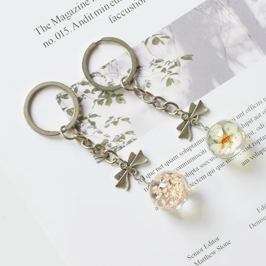 

New Metal Key Chain For Woman Crystal Glass Ball Dried Flower Pendant keychains Angel Wings Charm Key Ring Jewelry Diy