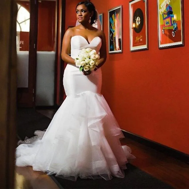 African Wedding Dresses Mermaid Sweetheart Off the Shoulder Beaded Waist Elegant Wedding Gowns Ruffles Skirt Bride Dresses
African Wedding Dresses Mermaid Sweetheart Off the Shoulder Beaded Waist Elegant Wedding Gowns Ruffles Skirt Bride Dresses