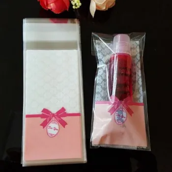 

100pcs 5*10+3cm Pink Bow OPP Mini Lipstick and Lip Balm Cosmetics Gift Package Plastic bags Jewelry Candy Packaging Bags BZ132