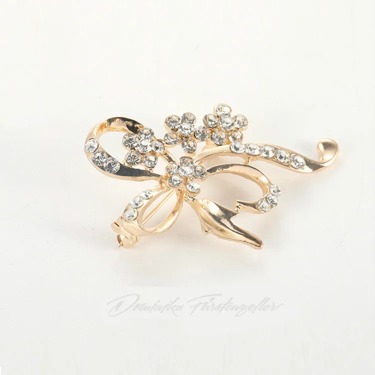 

Korean Version Of The 2019 Fashion New Brooch Temperament Ladies Bow Crystal Spring And Summer Simple Brooch Wholesale Brooch