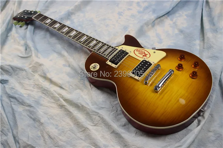 

Fantasy Guitar Company,mahogany guitar,tiger striped maple top,open wax potted pickups Chinese electric guitar