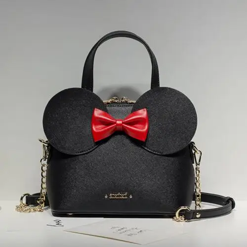 Baratos Venta limitada nuevos bolsos de moda de alta calidad de cuero PU bolso de mujer Mickey gran oreja Concha dulce arco cadena bolso de hombro femenino