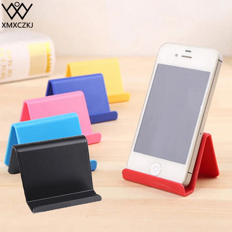 

XMXCZKJ Universal Desktop Cell Mobile Phone Stand Candy Color Support For Smartphone Tablet Flexible Folding Desk Bracket Holder