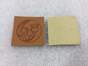 

custom leather labels for jeans, bags, shoes in high quality, artificial leather label, debossed/engraved logo