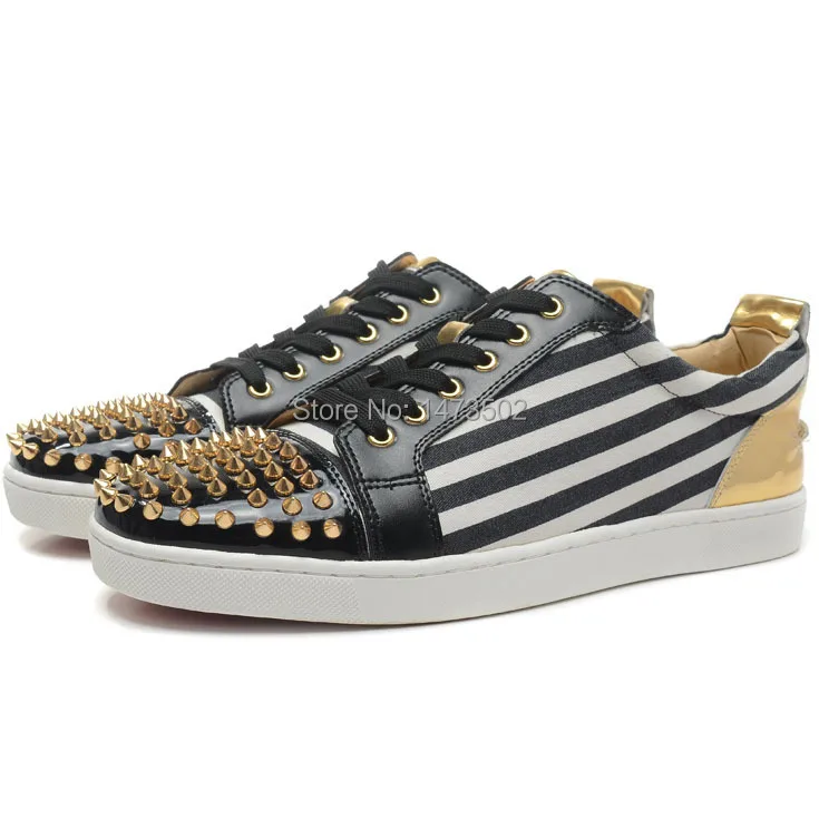 red bottom spiked sneakers