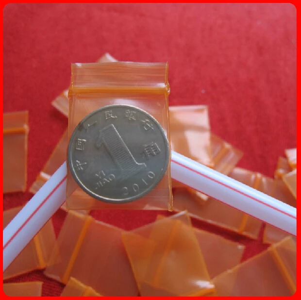

Small Zipper Lock Plastic Packaging Bags 2*2.8cm Orange Clear Reclosable Plastic Storage Pouches 0.2mm Thickness